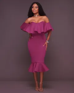 Full body view of a plum off-the-shoulder ruffle midi dress on a professional studio model