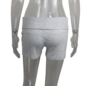 Close-up back view of light gray ribbed cotton yoga shorts with fold-over waistband detail