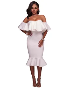 Elegant white off-the-shoulder dress featuring a large ruffled top and mermaid hemline.