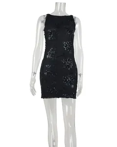 Detailed macro view of black lace embroidered mini dress with elegant sparkling sequins decor
