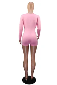 Rear view of a pink long-sleeved bodycon bodysuit loungewear displayed on a mannequin.
