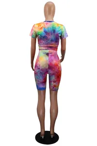 Back view of a vibrant colorful tie-dye two-piece sportswear set shown on a mannequin