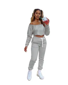 Detail view of grey off-the-shoulder sweatshirt and matching fleece sweatpants set