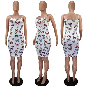 Detailed view of white butterfly print camisole dress showing front side and back views