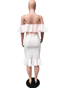 Back view of an elegant pink off-shoulder midi dress with layered ruffle details.
