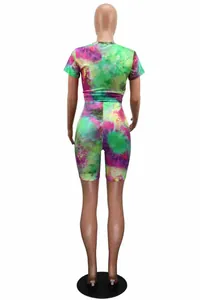 Back view of women's colorful tie-dye two-piece set with short sleeves and shorts
