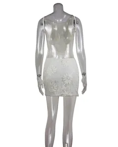 Detailed back view of a white lace embroidered sequin backless mini party dress for women