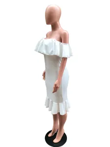 Side profile of white off-the-shoulder midi dress featuring ruffled neckline and hem details