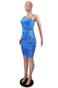 Detail view of a blue spaghetti strap bodycon dress with vibrant butterfly print