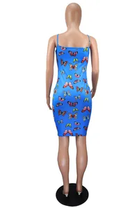 Back view of a blue bodycon dress with colorful butterfly print on tan mannequin
