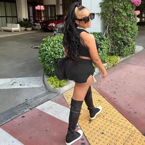 Stylish black two-piece summer fashion set featuring sleeveless tank top and side-slit shorts