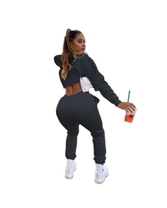 Detail of women's two-piece cropped hoodie and sweatpants set in dark grey