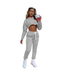 Detailed view of women's grey cropped hoodie and matching sweatpants leisurewear set.