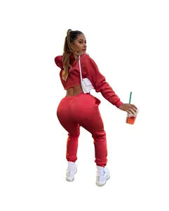 Red two-piece fleece tracksuit with cropped hoodie and high-waisted sweatpants