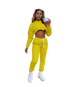 Detail view of women's vibrant yellow solid color fleece two-piece tracksuit set