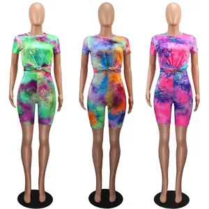 Vibrant tie-dye short sleeve top and shorts two-piece activewear set for women