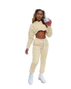Detail view of the cream fleece-lined cropped hoodie and jogger pants two-piece set