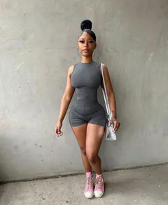Full body view of a stylish sexy grey round neck sleeveless slim fit romper for women