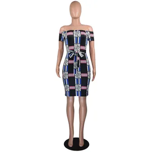 Elegant off-the-shoulder knee-length dress featuring a vibrant geometric Greek key print design