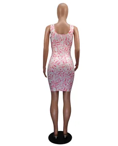 Back view of sexy sleeveless bodycon mini dress with all-over red money bill print