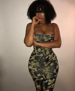 Close-up view of the sexy bodycon camouflage cami dress showing fit and fabric texture.