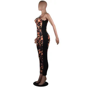 Side view of sexy backless camouflage jumpsuit with black side paneling on mannequin