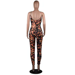 Full back view of a slim-fit orange camouflage backless jumpsuit for women on a mannequin