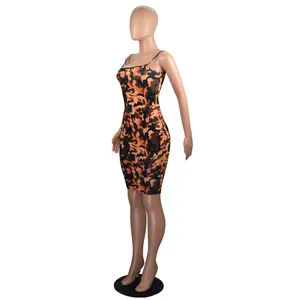 Side view of a sexy bodycon mini dress featuring a vibrant orange camouflage print