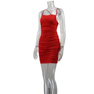 Detailed view of a red ruched sleeveless bodycon dress on a transparent mannequin