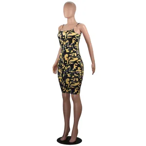 Detailed view of yellow and black camouflage print bodycon dress on a studio mannequin