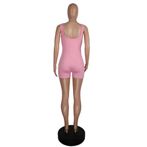 Full back view of a pink ribbed knit tank romper jumpsuit on a display mannequin.