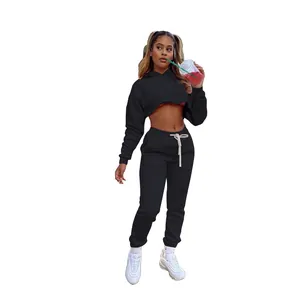 Solid color two-piece sportswear set with cropped hoodie and matching fleece joggers