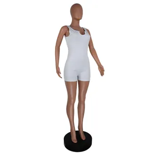 Detailed macro view of white ribbed knit U-neck sleeveless bodysuit romper on mannequin