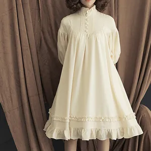 Elegant cream Lolita dress featuring lantern sleeves and delicate ruffled hem details