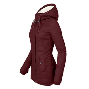 Side view of women's burgundy hooded winter parka featuring warm white fleece lining