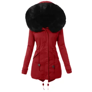 Frontal view of women's stylish red winter parka jacket featuring a large black faux fur hood