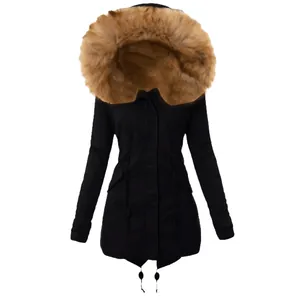 Close-up of the oversized faux fur hood on a black women's winter parka jacket