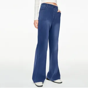 Full-length view of high-waisted straight-leg blue denim pants on a model for women