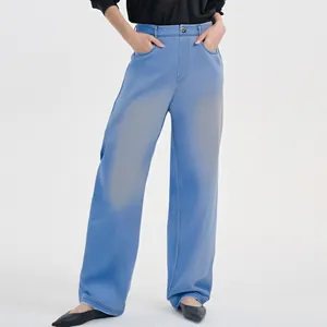 Women's high-waisted light blue straight-leg jeans featuring a trendy wide-leg fit.