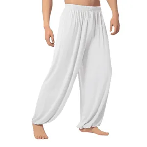 Detailed macro view of white loose men's yoga harem pants with elastic ankle cuffs