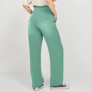 Rear view of trendy high-waist green straight-leg jeans with functional back pockets