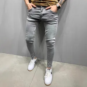 Premium men's light grey stretch skinny jeans featuring a modern European street style fit