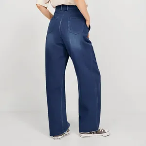 Detailed back view of high-waisted straight-leg denim trousers in a deep navy blue wash