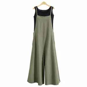 Casual loose olive green cotton overalls for women featuring a comfortable wide leg design