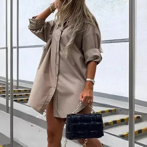 Oversized khaki cotton linen button-down shirt for women in casual outdoor style