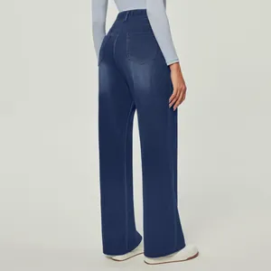 Detail showing the back pockets and fit of women's high-waisted wide-leg stretch jeans