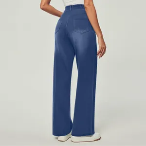 Detail view of high-waisted wide-leg blue denim jeans for women