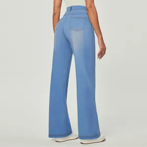 Back view of high-waisted wide-leg light blue jeans with contrast stitching details