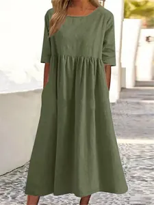Loose olive green cotton linen maxi dress with round neck, short sleeves and pockets