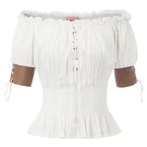 Renaissance off-the-shoulder white blouse with smocked waist and lace-up cuffs details.